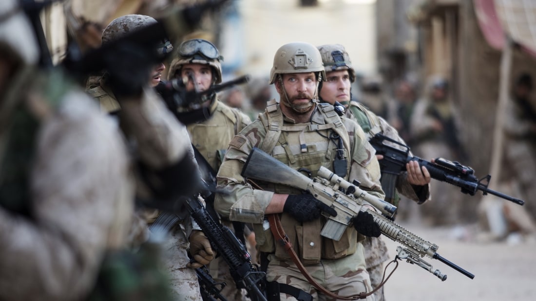 Bradley Cooper portraying U.S. Navy SEAL Chris Kyle in American Sniper.