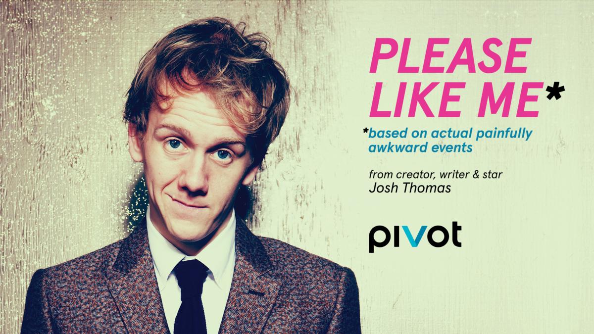 Josh Thomas standing against a white wall for the Pivot series Please Like Me.